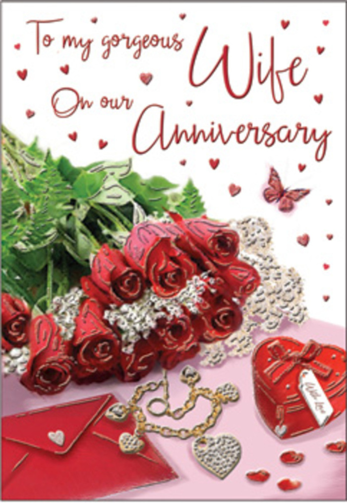 In this richly detailed anniversary scene, a bouquet of classic red roses takes centre stage, presented as though resting on a polished surface in a cosy Lea Bridge home. Each rose is luxuriously full, the petals layered and gently curling at the edges, creating the plush, velvety texture that makes red roses such timeless symbols of romance. The blooms are gathered together and wrapped or framed with lush green foliage, the leaves adding depth, structure, and the pleasing contrast of nature's fresh tones against the deep crimson flowers. Around this floral focal point, delicate lace-like accents and subtle heart motifs draw the eye, their softness and intricacy evoking the tender details of a carefully chosen anniversary card. A small jewellery set is artfully placed nearby, perhaps a shimmering necklace and matching earrings, their metallic gleam and tiny stones suggesting gifts exchanged across many years. A vivid red gift box completes the arrangement, its surface rich and smooth, hinting at something special tucked inside. The scripted message on the card is gracefully styled, curling across the page in fluid lines that mirror the natural curves of the petals and leaves. Throughout the composition, textures of velvet, gold, silk, and lace seem to overlap, creating a sense of warmth and tactile comfort, like wrapping up in a familiar embrace. The lighting feels soft and flattering, as if filtered through gauzy curtains overlooking the paths and waterways around Lea Bridge, lending the whole image a gentle glow. It is a tableau of enduring affection, perfect for marking an anniversary with a design that feels both classic and intimately personal, as if created by a local florist who truly understands the romance in small, thoughtful gestures.