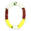 An elegant ceremonial garland in an open U-shape is presented against a crisp white background, giving the impression that it is gently suspended in mid-air, ready to be placed over a cherished photograph, deity, or honoured guest. The top arch is fashioned from pure white blooms, densely clustered into a smooth, pillowed band that feels tranquil and refined, the kind of quiet beauty you might associate with early-morning prayers in a small shrine off Lea Bridge Road. These blossoms, similar to tiny chrysanthemums or delicate jasmine, set a tone of purity and peace. Flowing from this pale crown, both vertical sides of the garland transition into indulgent maroon sections, the petals so closely strung that the surface appears almost velour-like, rich with shadow and texture. This deep, reddish-brown hue introduces a sense of depth and solemnity, ideal for funeral tributes, remembrance ceremonies, or spiritual gatherings. Along the lowest curve, the colour brightens into a band of radiant yellow flowers, their cheerful tone adding warmth and gentle hope, like a soft glow over Millfields Park on a clear afternoon. Scattered between the main colour blocks are slim accents of fresh green leaves, particularly where white meets maroon and where the yellow blends into small touches of white and foliage, bringing an organic rhythm and visual breathing space. The entire garland is luxuriously full, with hundreds of tiny florets contributing to a textured, opulent look that could be either expertly made artificial flowers or meticulously fresh blooms. The harmonious blend of white, maroon, yellow, and green makes this garland a dignified choice for tributes and cultural ceremonies throughout the Lea Bridge and Clapton area.